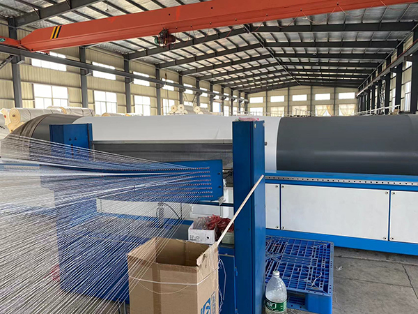 How is the base fabric of PVC-coated fabric woven?