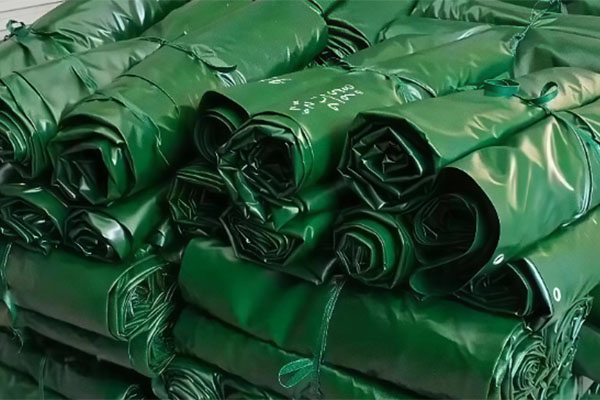 What Thickness of PVC Tarpaulin Should Be Used for Covering Large Cargo